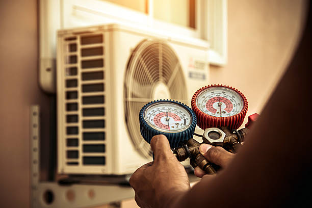 Professional Ac Installation technician working in Magnolia, OH
